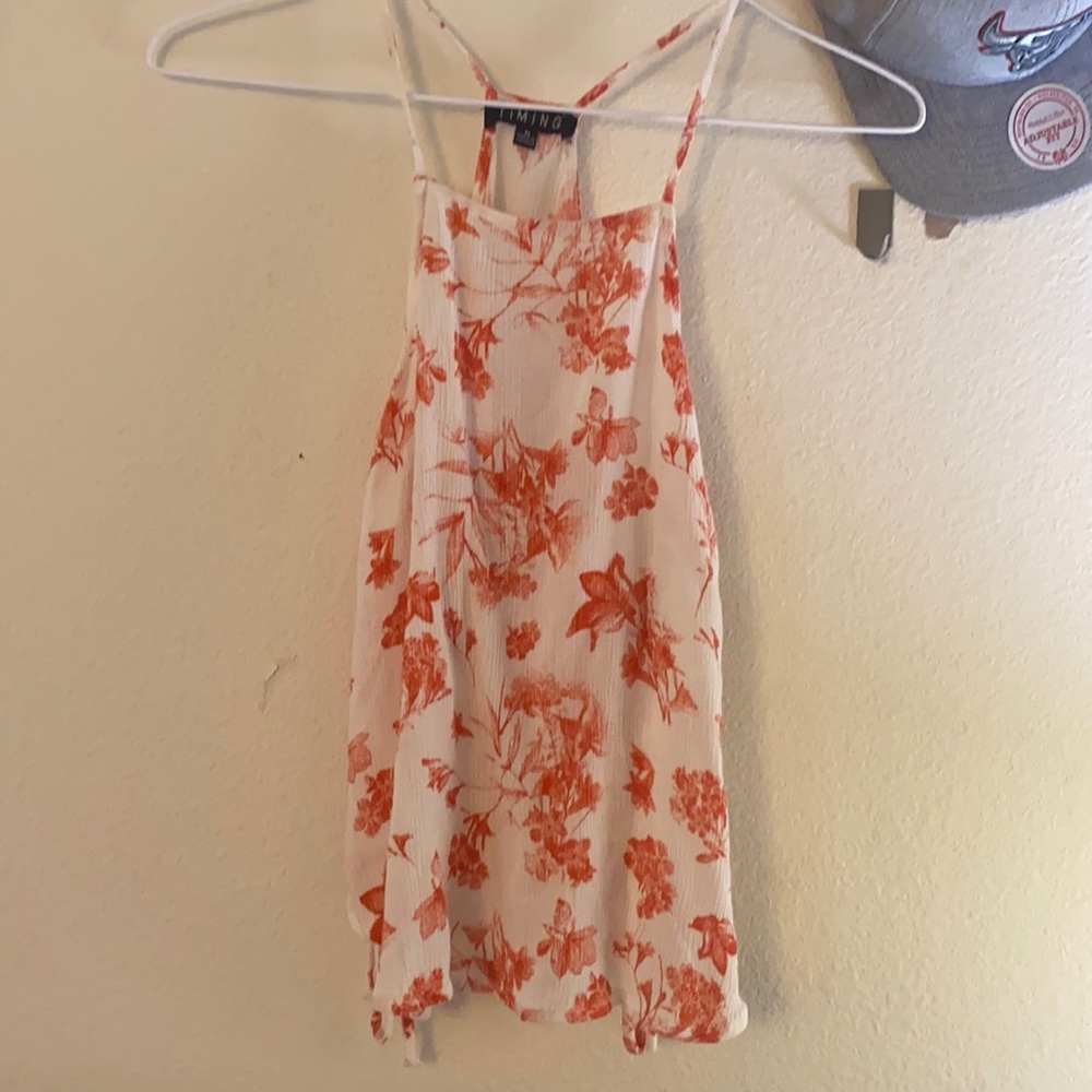 White and red flower tank